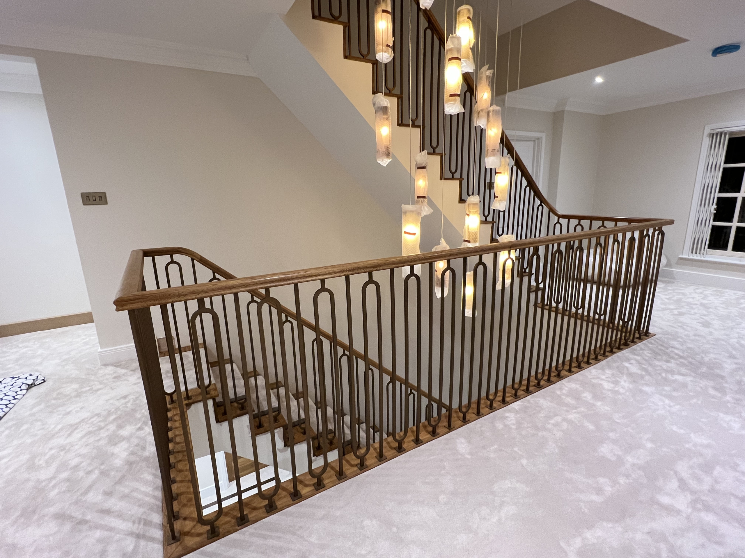 Closed tread staircase design with spindles -DDC London Closed tread staircase design with spindles -DDC London