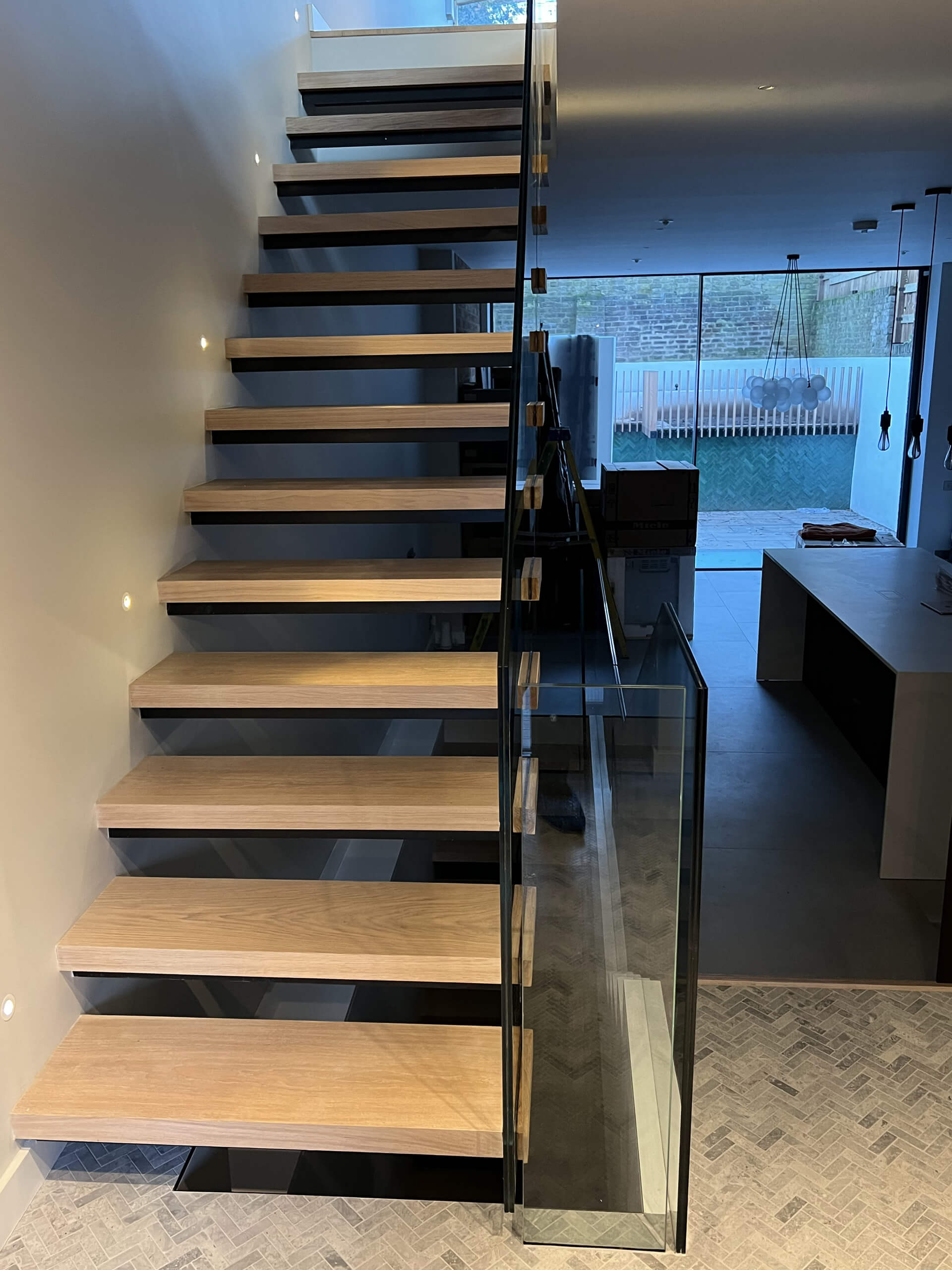 Floating Staircase With Frameless Glass Balustrade And Light Brown Oak Treads (9)